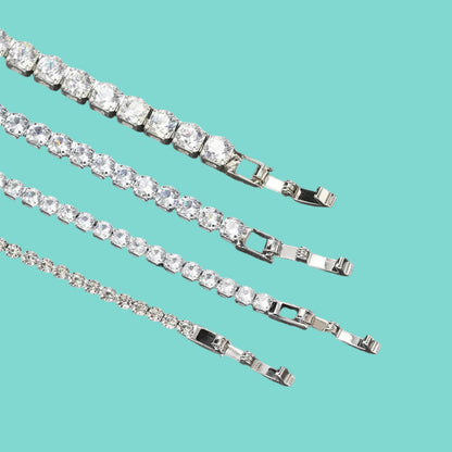 This tennis bracelet is made from 925 sterling silver with a white gold plated finish. It has a simple and elegant design that fits any style. Light, comfortable, and easy to wear every day or on special occasions.