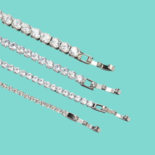 This tennis bracelet is made from 925 sterling silver with a white gold plated finish. It has a simple and elegant design that fits any style. Light, comfortable, and easy to wear every day or on special occasions.
